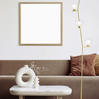 Blank frame mockup in modern interior design with trendy vase an