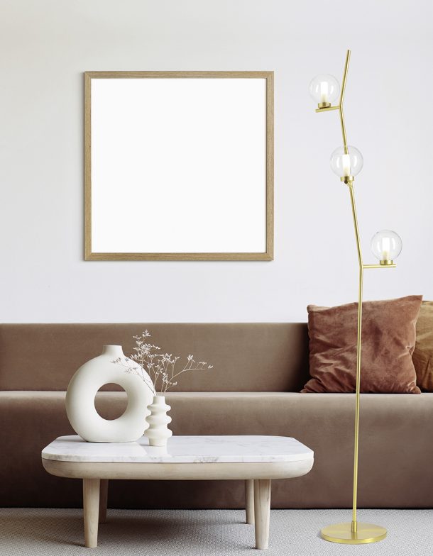 Blank frame mockup in modern interior design with trendy vase an