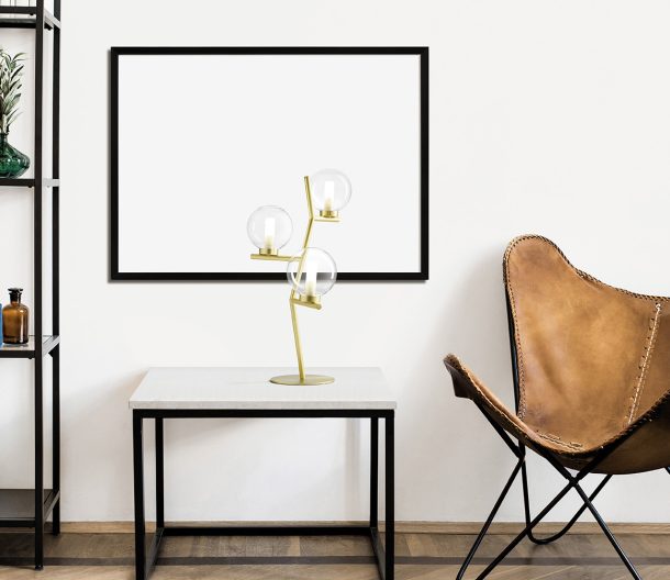 Blank picture frame mockup on white wall. White living room desi